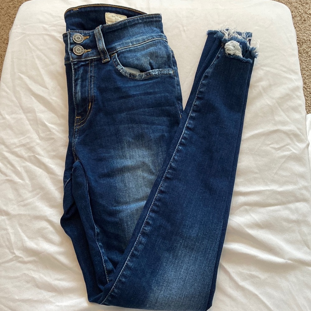 Bridge by gly blue jeans; destress on ankles; size 25